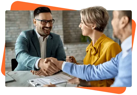 3 people shaking hands at a table - payment solutions