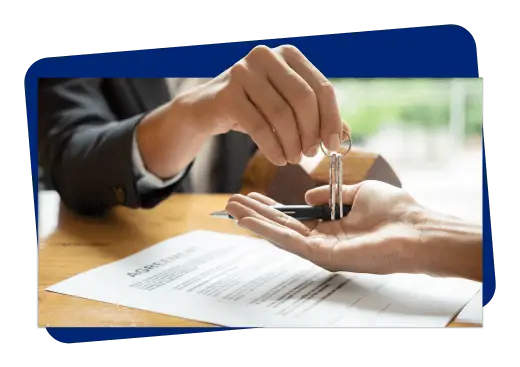one hand handing key to another person - real estate payment solutions